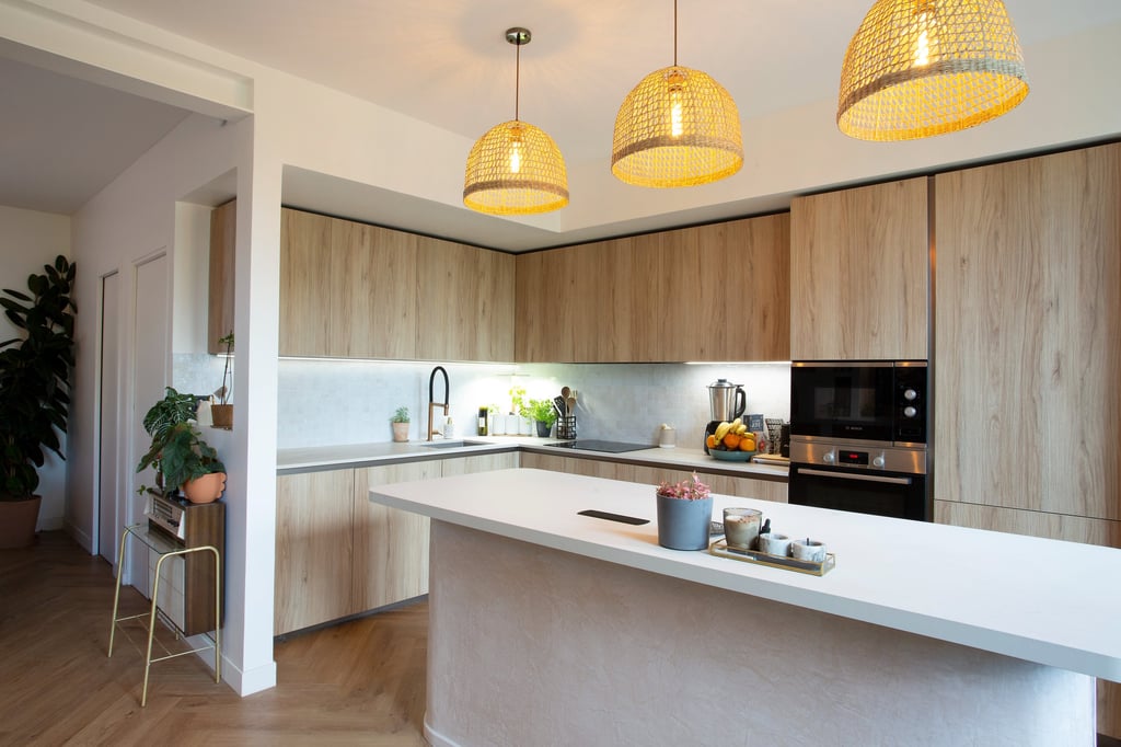 a kitchen with a large island and a large island