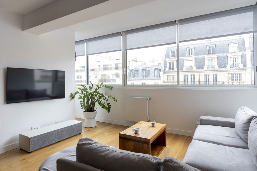 a living room with a couch and a television