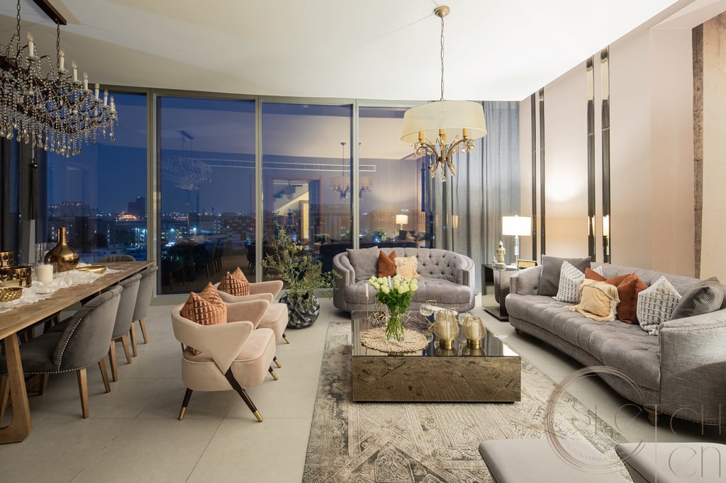 a living room with a large window and a view of the city,  interior design