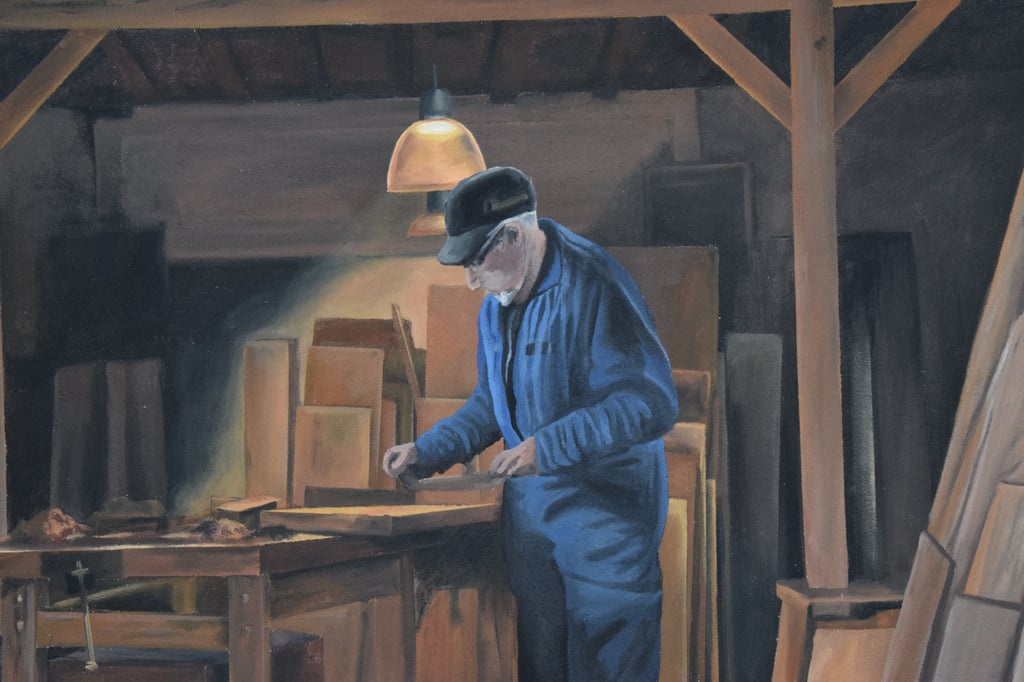 Détails d'une fresque peinte sur façade: un menuisier travaille le bois dans son atelier. Jura 39.