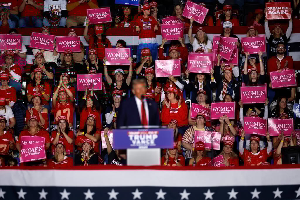 Trump Rally with "Women For Trump" signs held up in a crowd of women