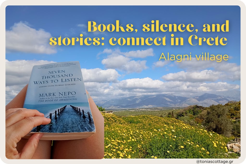 A person holding a book in their hands in nature in Crete