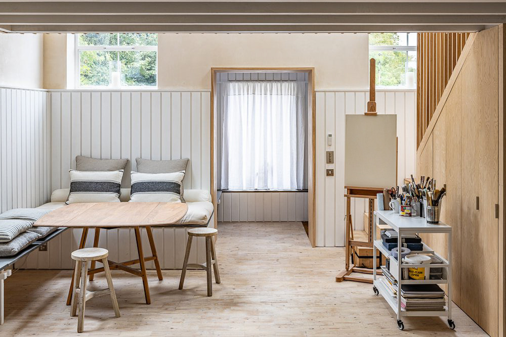 a living room with a couch and a table