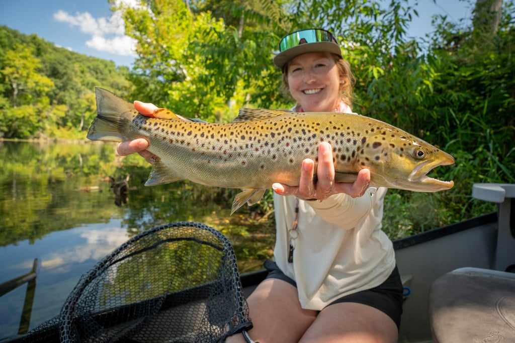 Check out Brianne with a big brown landed on a midge.