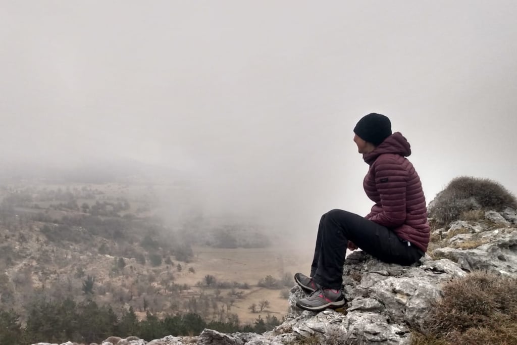 Kirsti in nature on the French Riviera reflecting her connection to personal growth and inner work