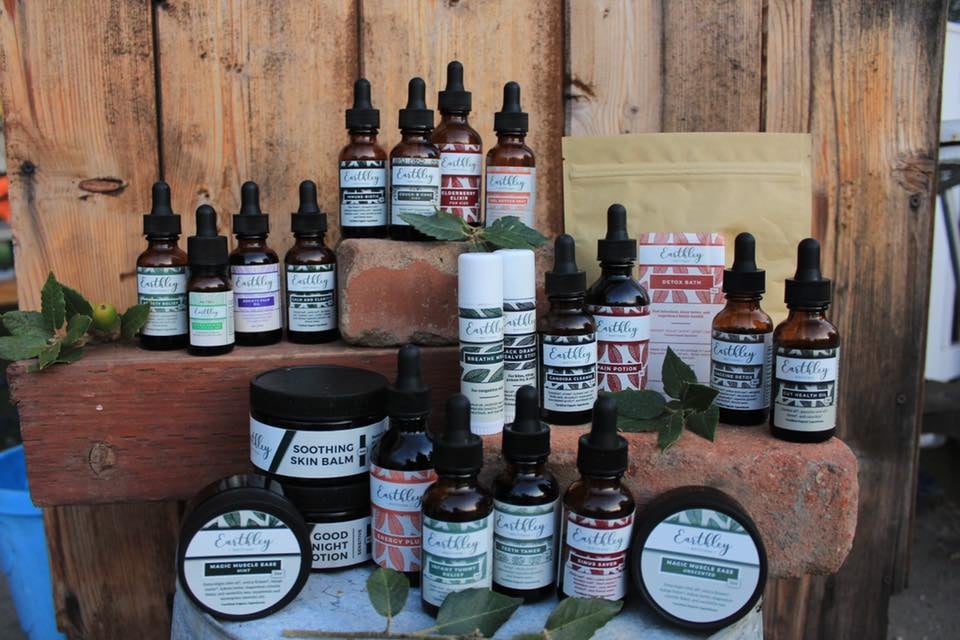 a variety of skin care products on a table