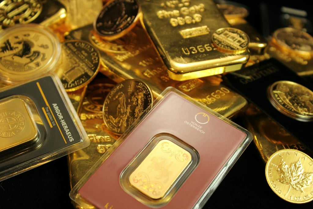 gold bars and coins representing long term potential of gold ira for retirement