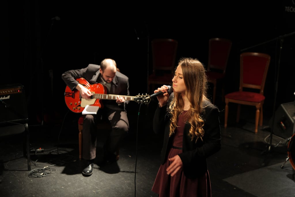 Koncerte gitaristas su dainininke