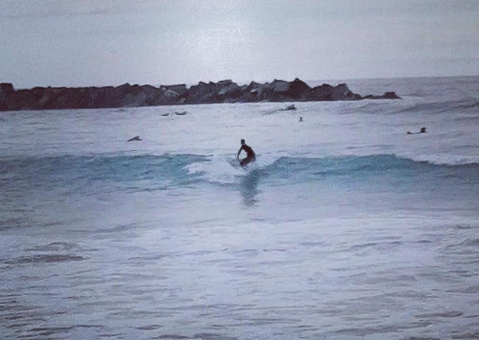 A surfer riding a wave.