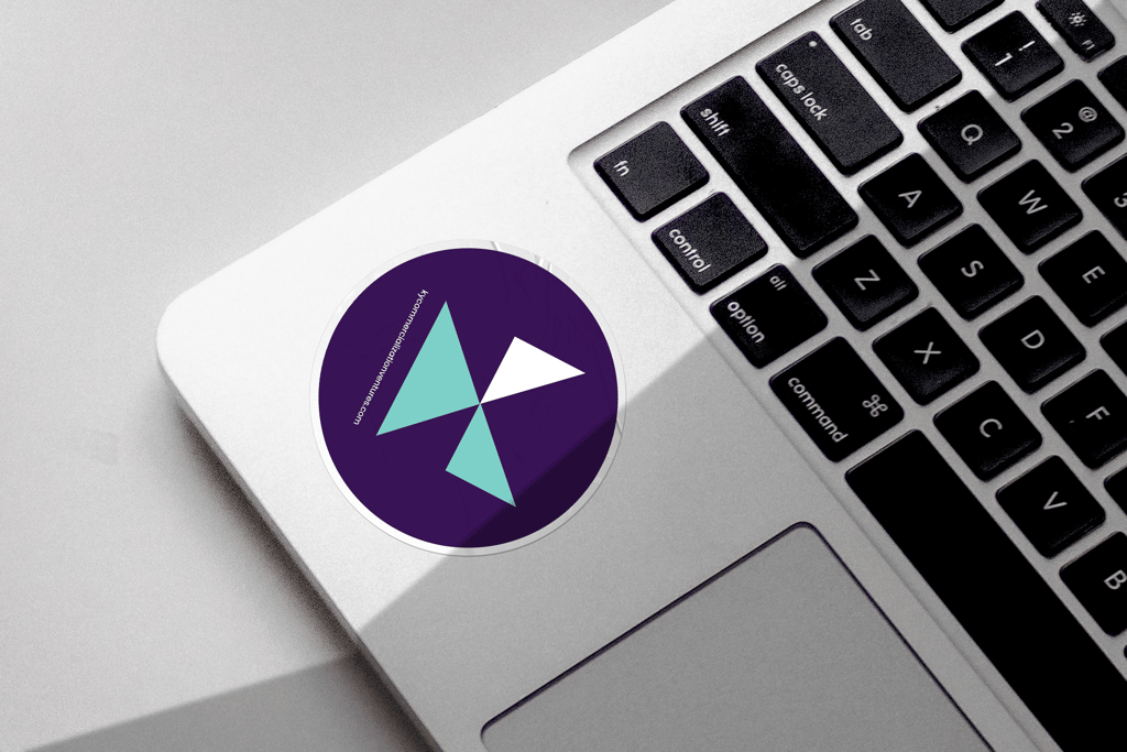 image of a keyboard with a sticker showcasing the KCV logo