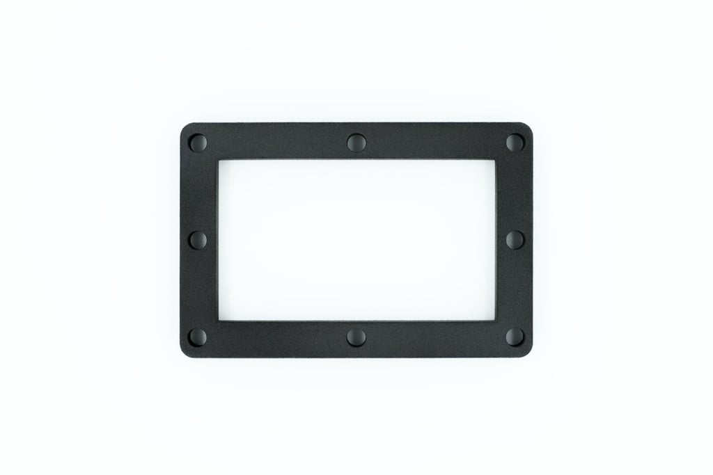 Nylon mounting spacer frame with multiple screw holes