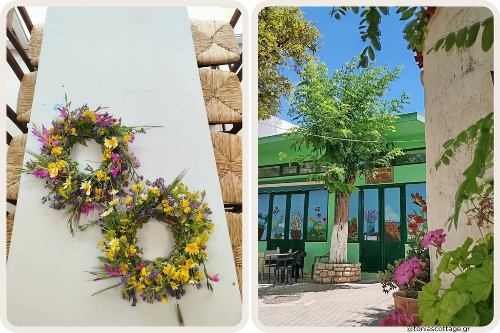 Finished wildflower wreaths on a table and a sunny village courtyard in Alagni Village, Crete.