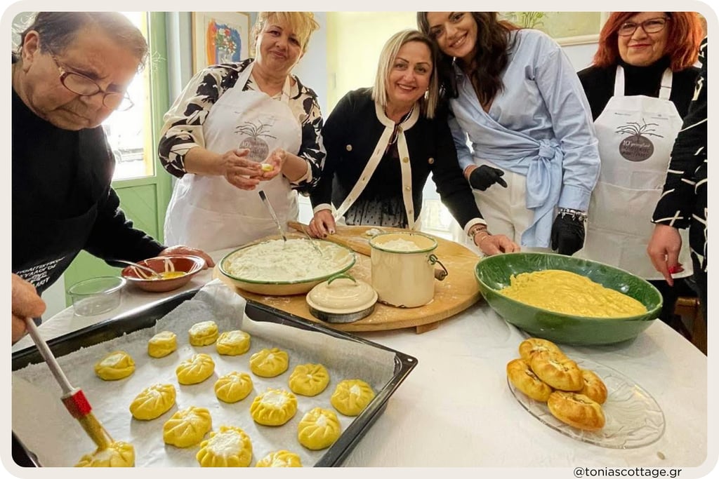 Women making traditional pastries at a cooking workshop at the Cretan Cuisine Festival.