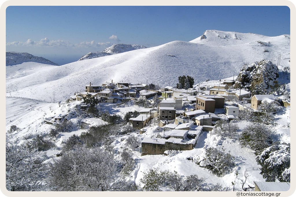 Stone village in Asterousia mountains Crete covered with snow in winter
