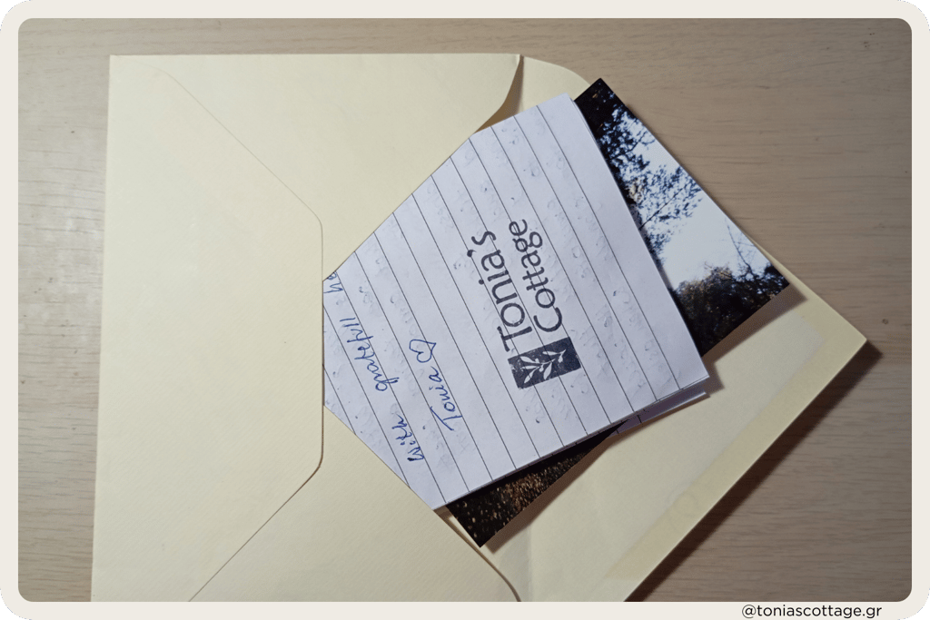 Letter in an envelope featuring a picture and a Tonia's Cottage stamp