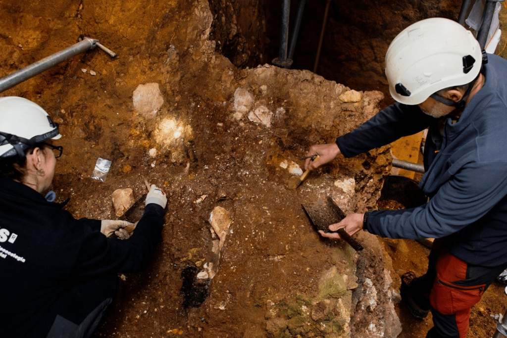 Archeologist near the cave at the Sima del Elefante site