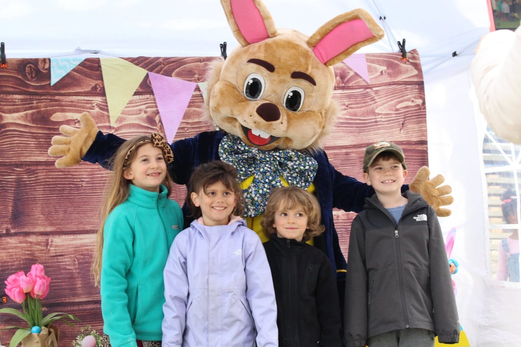 Easter Bunny poses with kids during a meet and greet