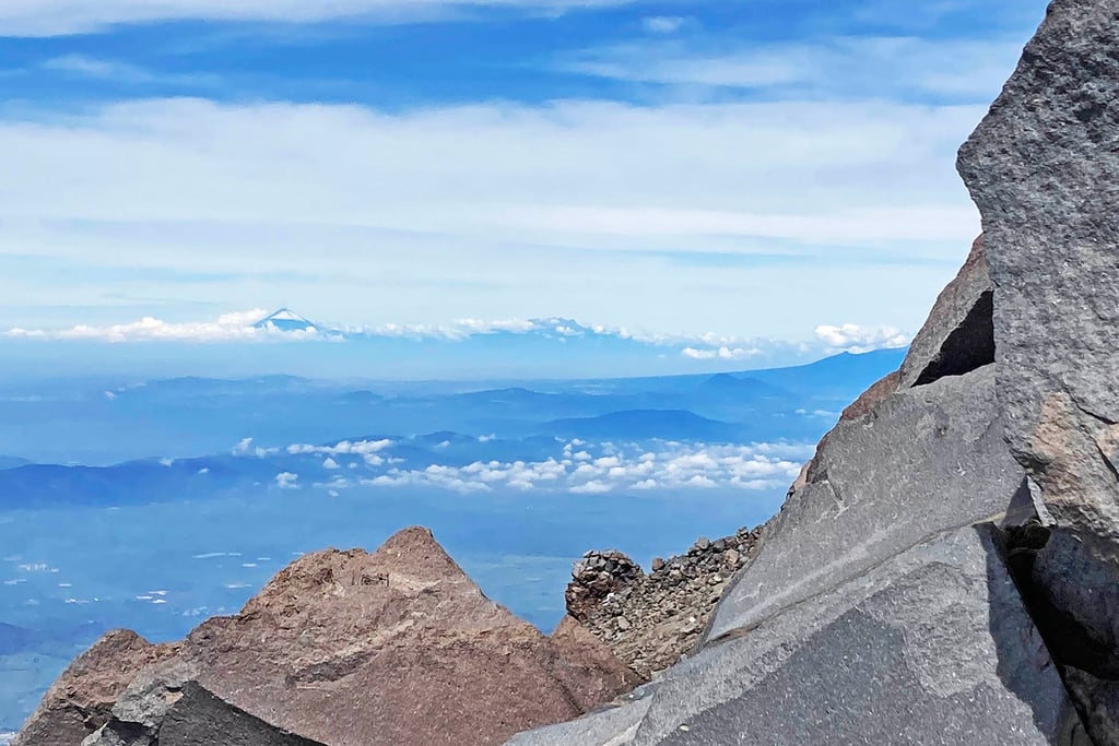 Popocatépetl and Iztaccíhuatl Seen on the Distant Horizon from Pico de Orizaba, Puebla, Mexico