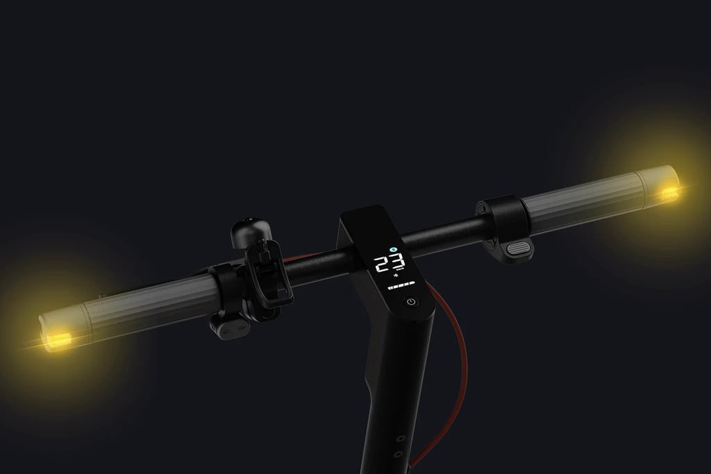 a bicycle with a clock on the handlebars