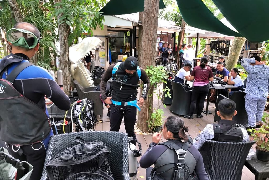 Sugbu diver and team gearing up for scuba diving in Shangrila