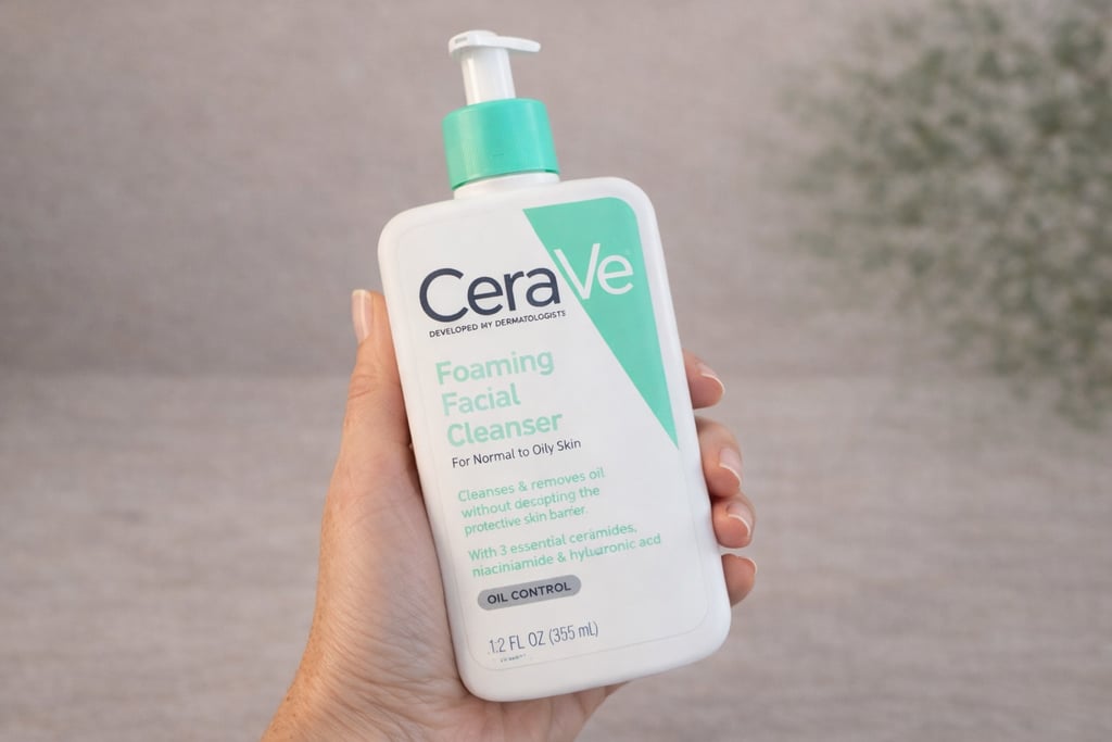 CeraVe Foaming Facial Cleanser for normal to oily skin held in hand
