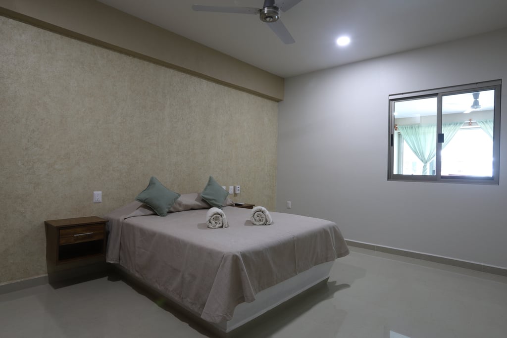 Habitación matrimonial en bungalows a pie de playa