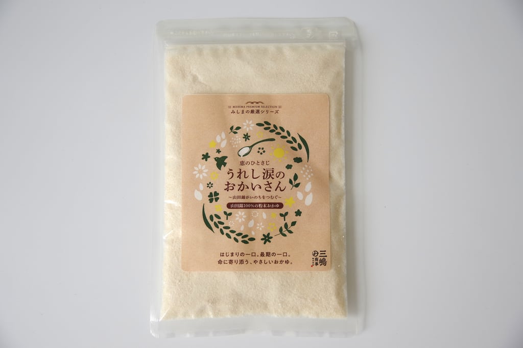 新商品「うれし涙のおかいさん」山田錦の米粉おかゆパッケージ正面｜堺市のニュースならサカイタイムズ