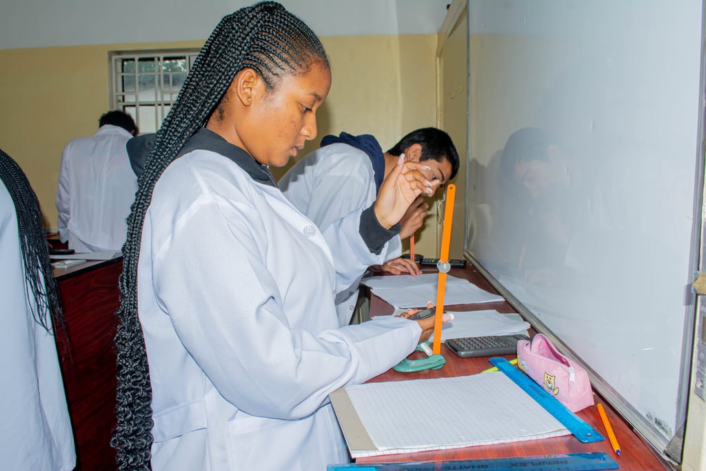 a woman in a lab coat and a man in a lab coat