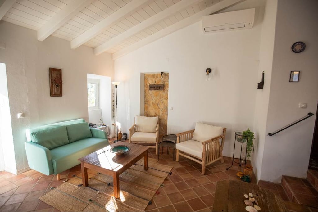 a living room with a couch and a table