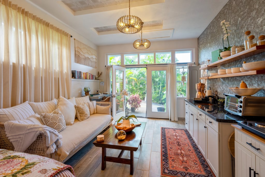 a beautifully decorated living room with a couch and a table