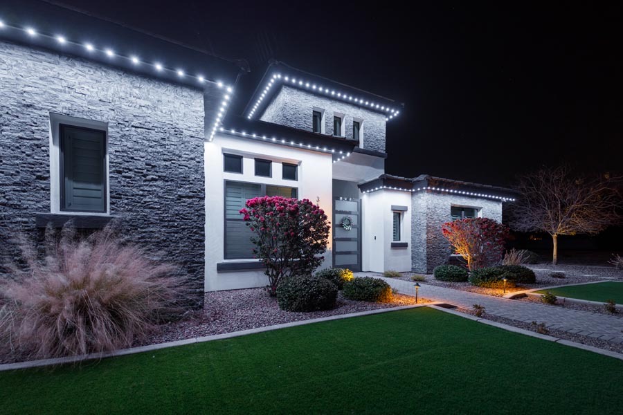 Residential home with professional installed permanent LED holiday lights