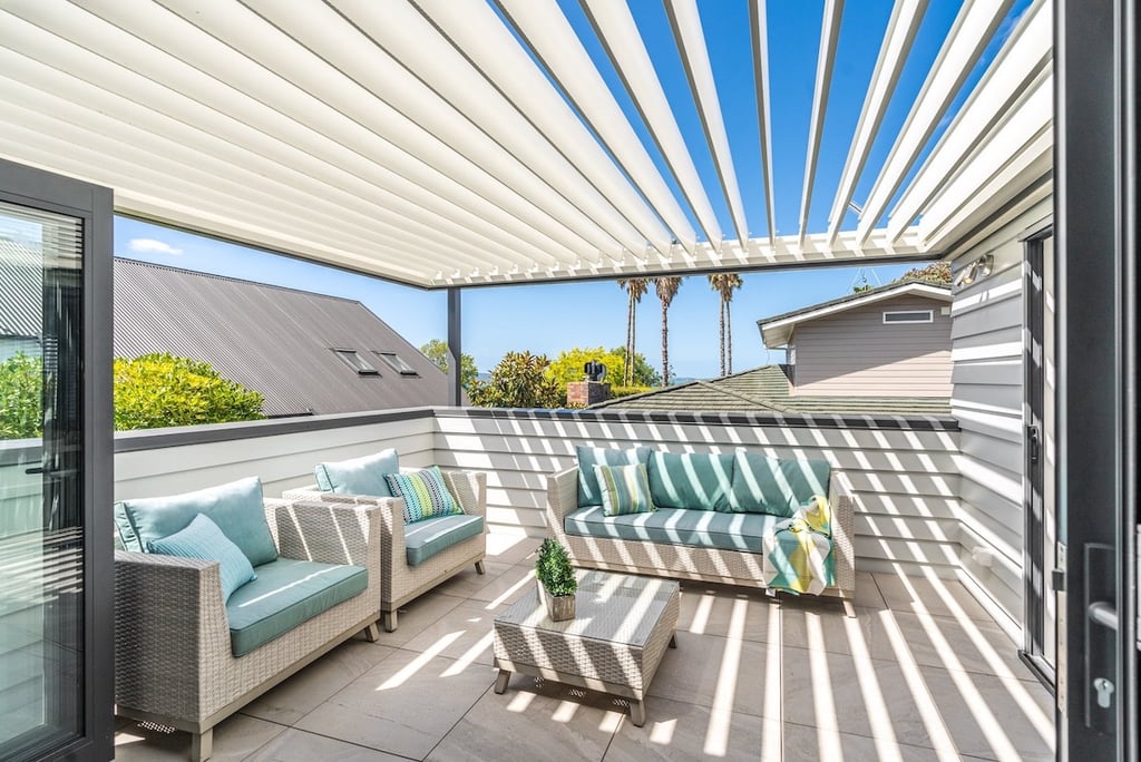 Outdoor living room louvered roof - Kohimarama Rd home renovation - Revive Builders Auckland