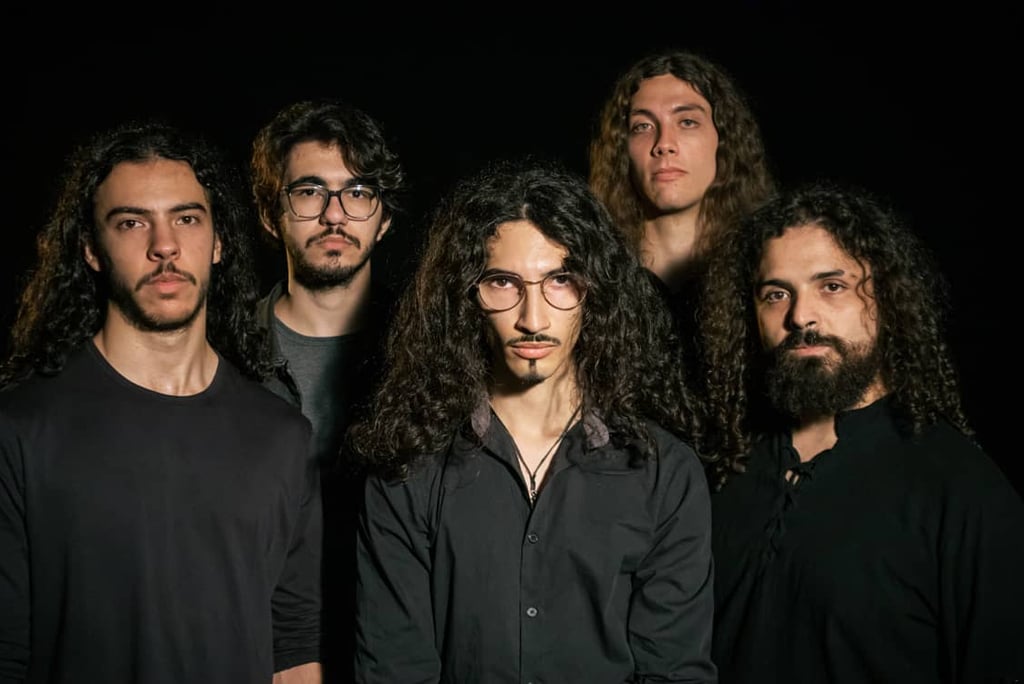 a group of men with long hair and beards