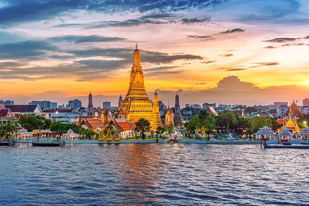 a large pagoda in the middle of a river