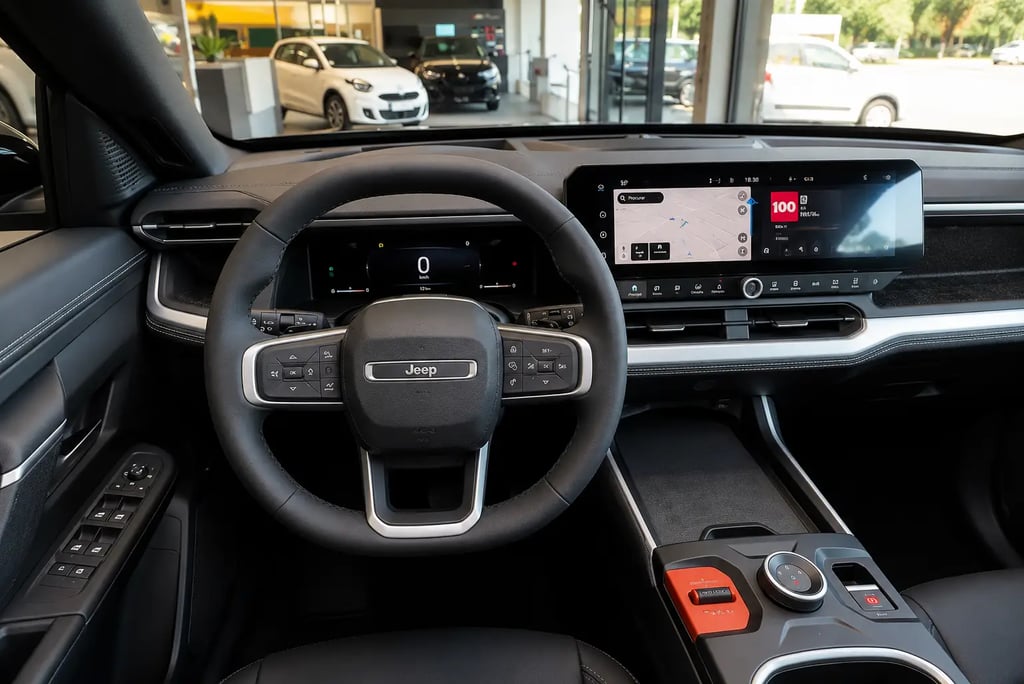 Interior do Novo Jeep Compass 2026 com painel digital e central multimídia panorâmica.