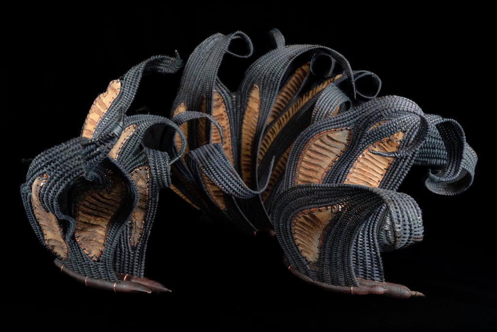 Crow Girl, 2025, cane, reed, framboyan pods, lluvia de oro pods, copper