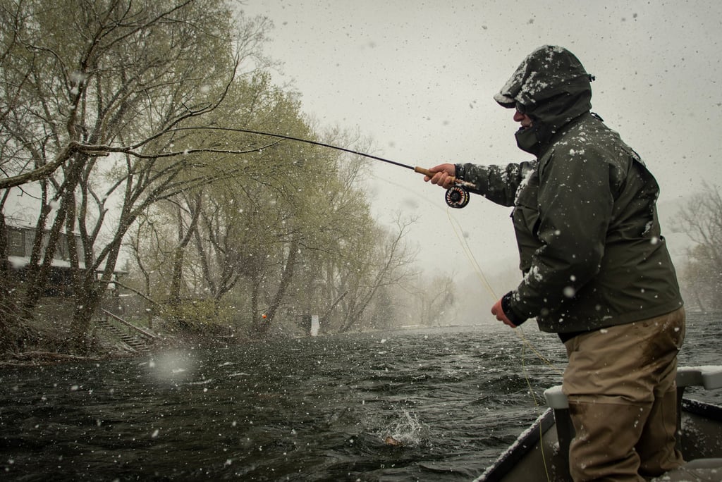 Fishing in the snow on the Watauga River.