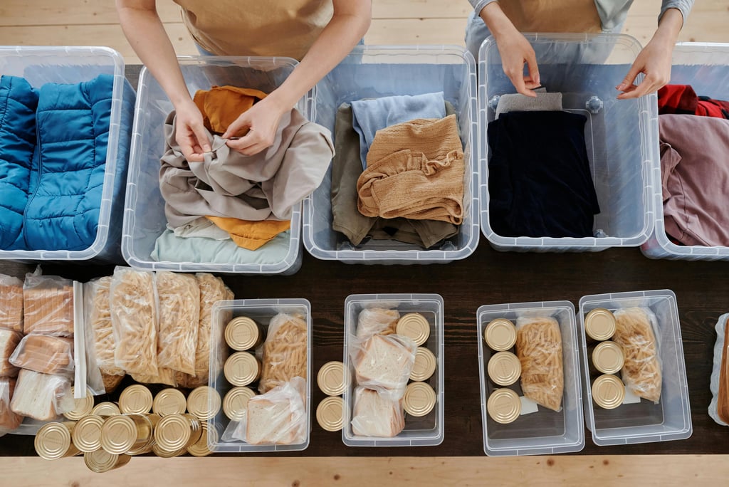 Volunteers sorting food and clothing donations