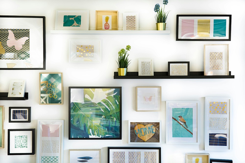 Various picture frames hanging on a wall