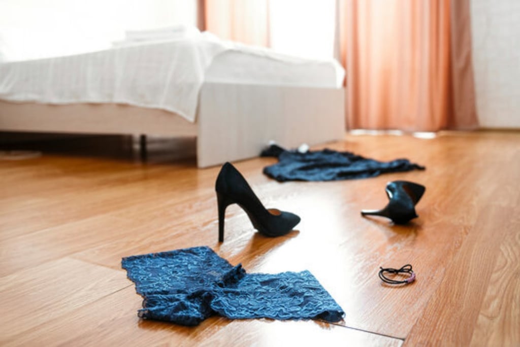 worn clothes on the floor: panties, high heels, a sexy dress, sell worn clothes 