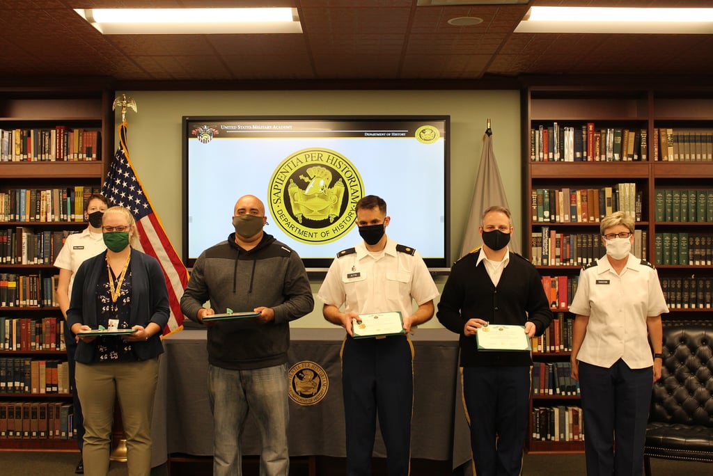 Laura Hooton (left) and other History Department members at an award ceremony at West Point, 2022