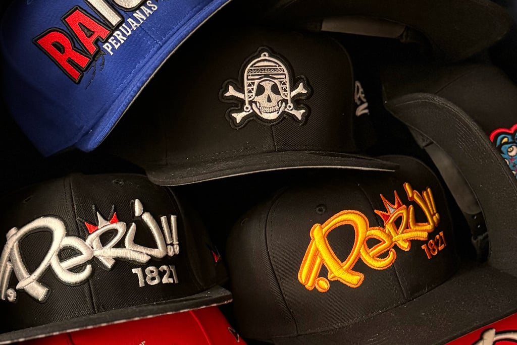 a bunch of peru street hats with a variety of different designs