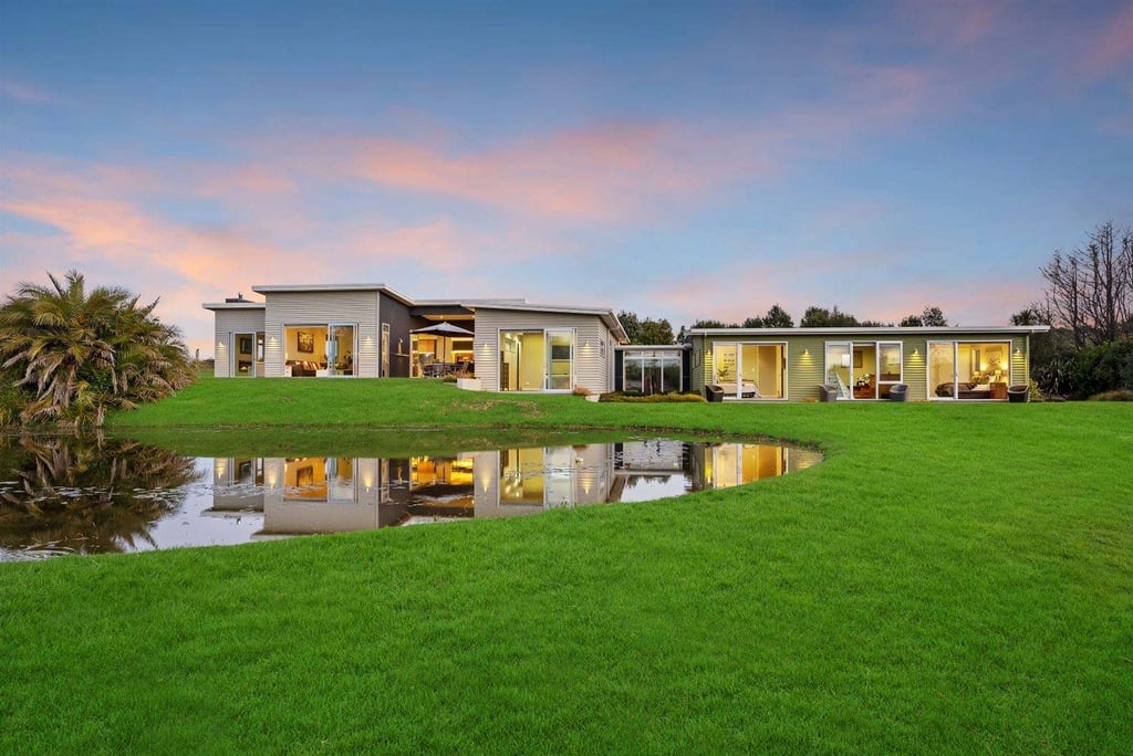 new addition countryside mono pitched weatherboard home, existing garage