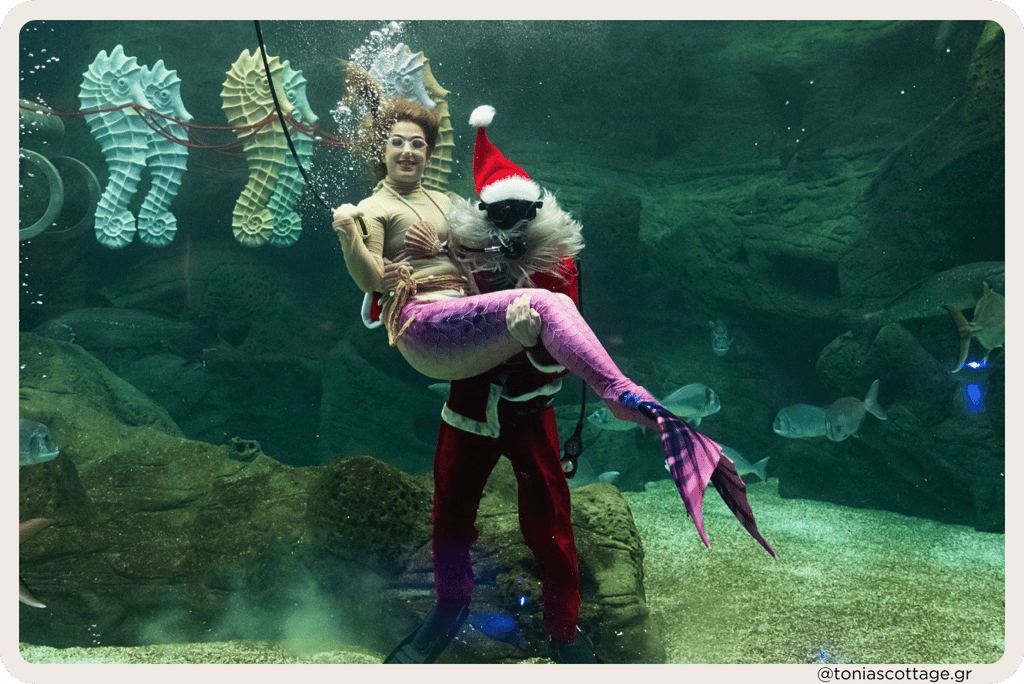 Christmas celebration at CRETAquarium Thalassokosmos with Santa Claus and a mermaid diving