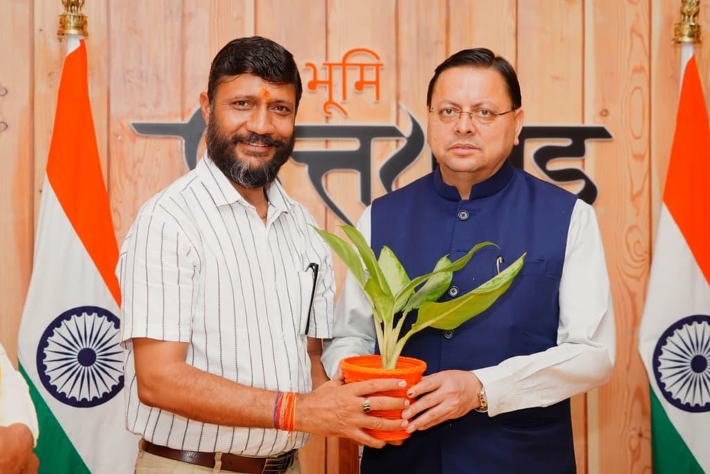 Santosh Khanduri with Chief  Minister Uttarakhand