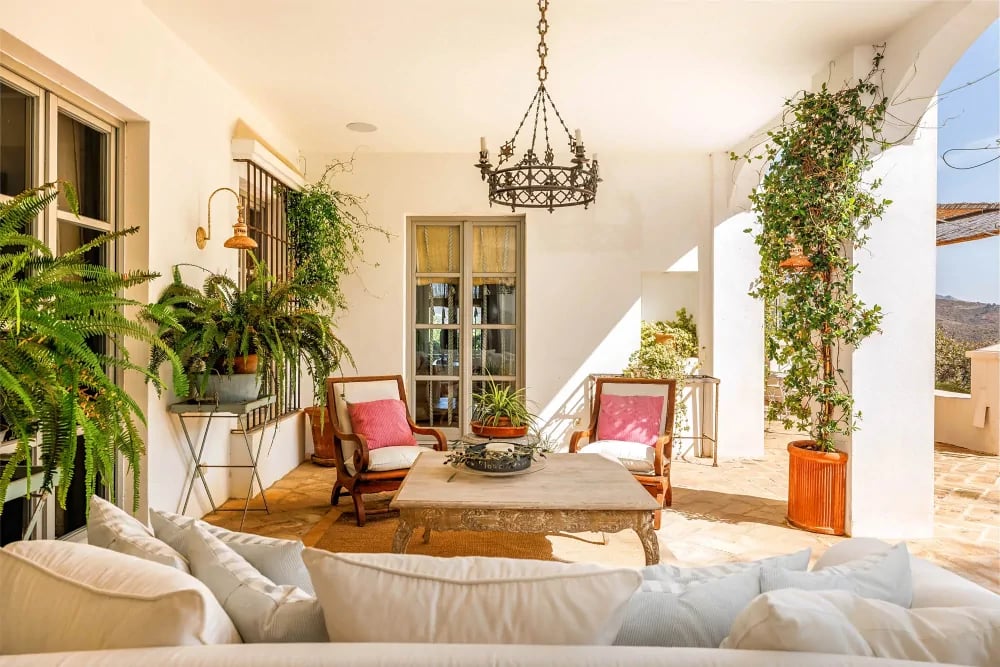 Terrace lounge with plants at Finca Santa Katerina