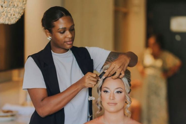 Deya Ventura creating an elegant bridal hairstyle during wedding day preparation in Punta Cana