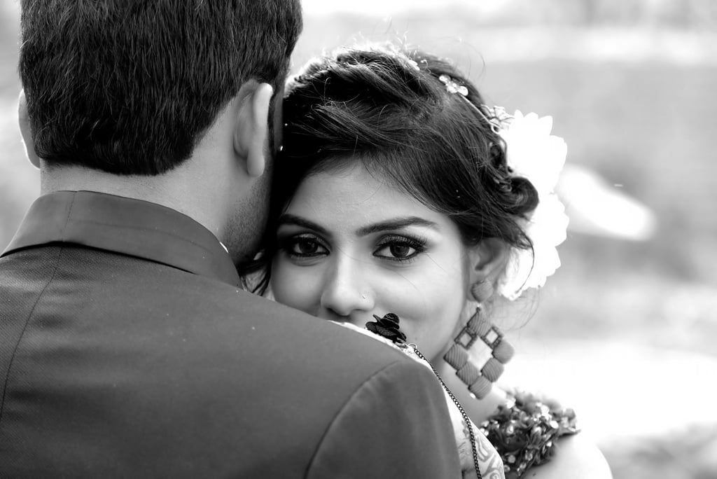 an modern asian couple in black and white on their special day