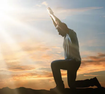 man praising god