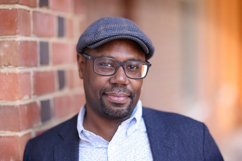 Rone Shavers, MFA vs PhD